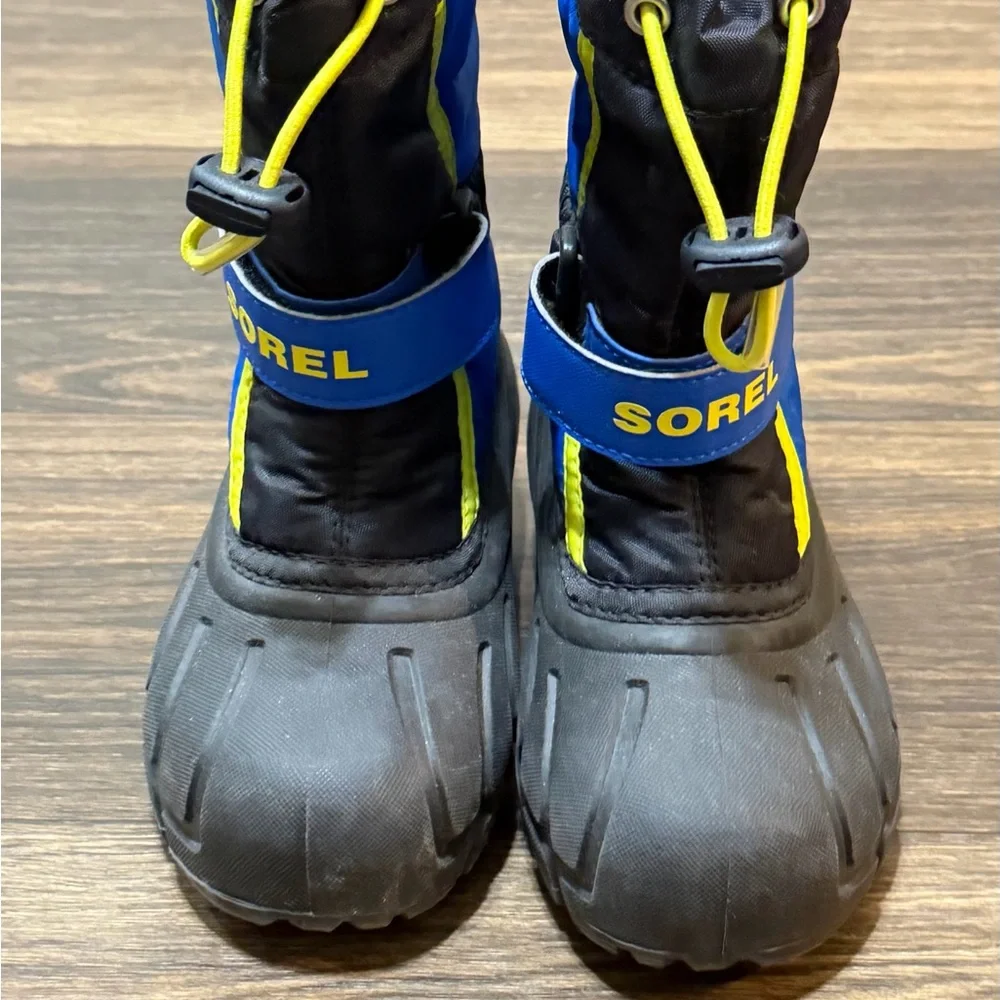 Sorel Kids Black and Blue Snow Boots with Yellow Accents